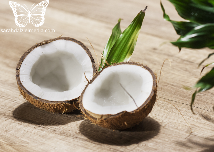 whole fresh coconut split in half